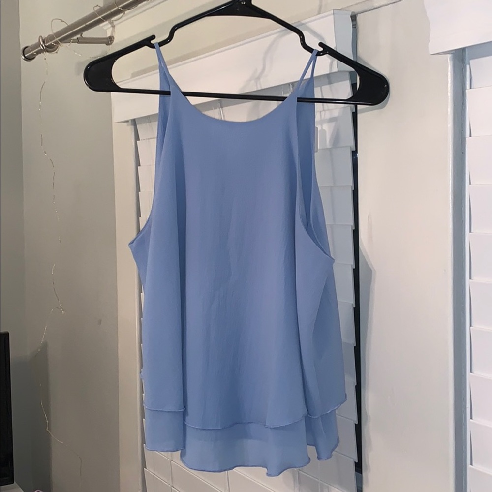 Julie billiart tank size L but fits like a S/M